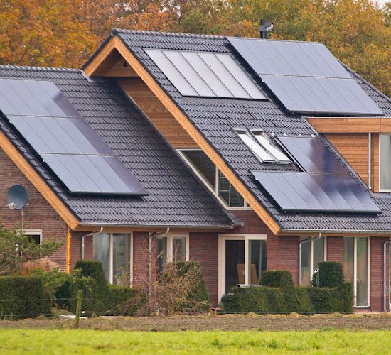 Photovoltaic Solar Panels on Newly Built Modern House
